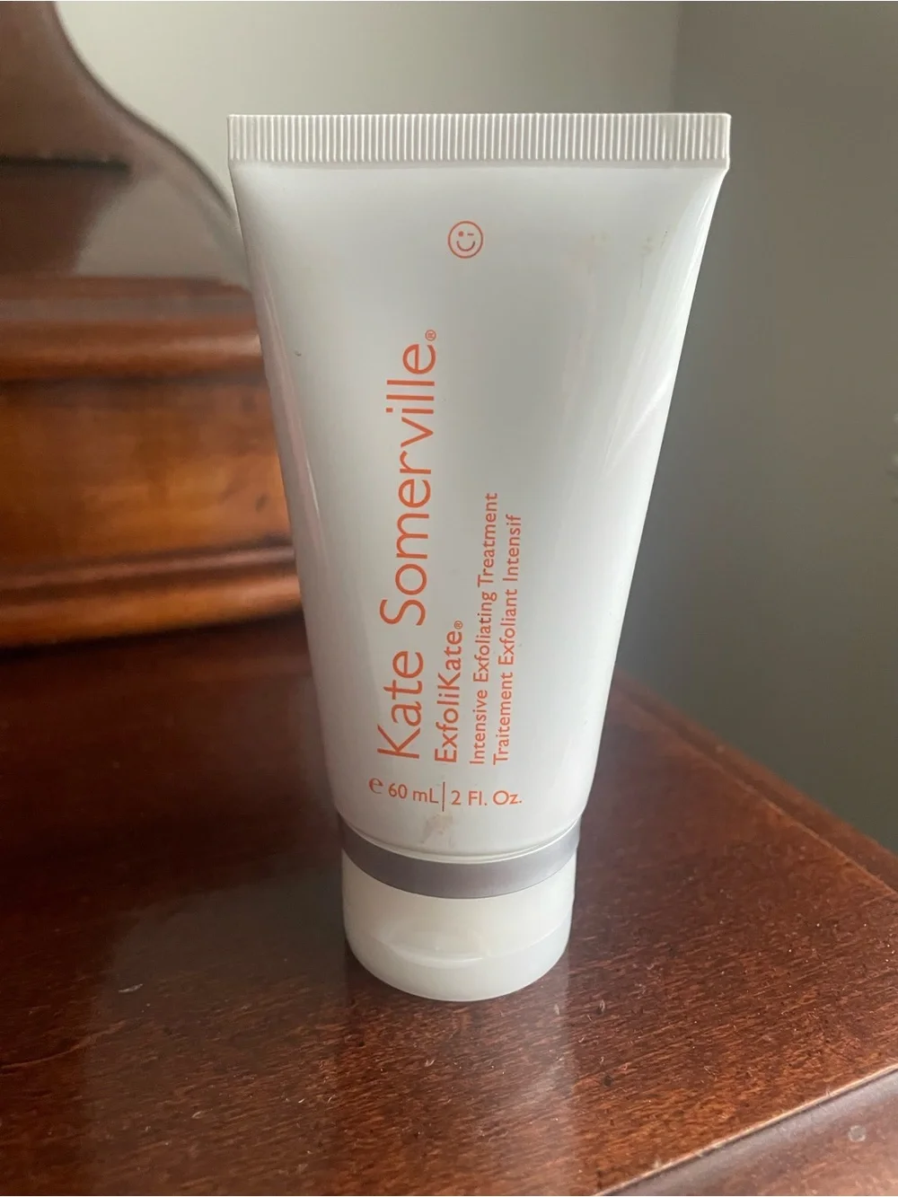 HUE White Tube Facial Cleanser & Exfoliant with Orange Text